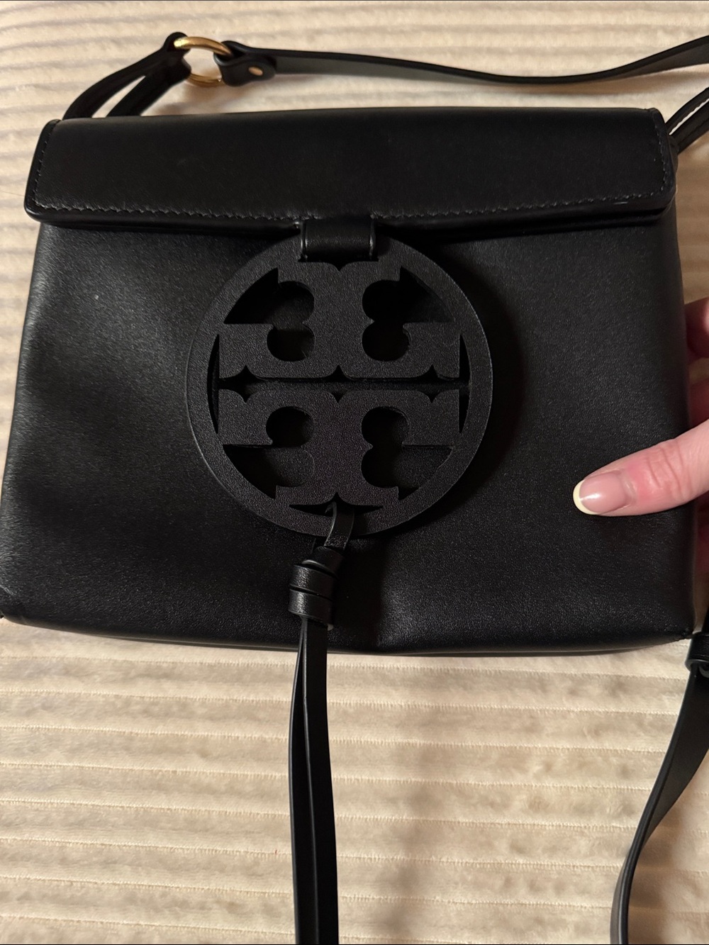 Tory Burch Miller Crossbody Black featuring a large perforated logo medal